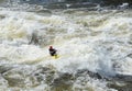 Kayaking in very rough rapids