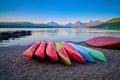 Kayaks along the shore of Lake McDonald, Glacier National Park, MT Royalty Free Stock Photo