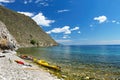 Kayaks on the coast of Lake Baikal Royalty Free Stock Photo