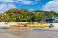 Kayaks lie on the Buccament Bay beach, Saint Vincent island Royalty Free Stock Photo