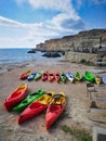 Kayaks lie on the shore near the sea without people Royalty Free Stock Photo