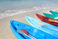 Kayaks near the water on sand beach. Royalty Free Stock Photo