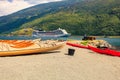 Kayaks and cruise ship in Flam, Norway Royalty Free Stock Photo