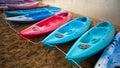 Kayaks of various colors