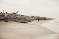 KAYAR, SENEGAL - JANUARY 17, 2020: Traditional painted wooden fishing boat in Kayar, Senegal. Africa Royalty Free Stock Photo