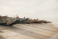 KAYAR, SENEGAL - JANUARY 17, 2020: Traditional painted wooden fishing boat in Kayar, Senegal. Africa Royalty Free Stock Photo