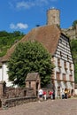 A view of traditional Alsacian architecture with old castle tower in Kaysersberg Royalty Free Stock Photo