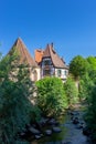 Historic half-timbered houses on the Weiss River in the village center of Kaysersberg Royalty Free Stock Photo