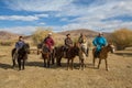 Kazakh Eagle hunters on horseback. In Bayan-Olgii Province is populated to 88,7% by Kazakhs.