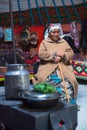 Kazakh family of hunters with golden eagles inside the mongolian Yurt. In Bayan-Olgii Province is populated mainly by Kazakhs