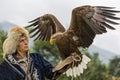 Kazakh eagle hunter near Almaty, Kazakhstan. Royalty Free Stock Photo