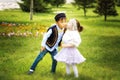 Kazakh little boy and girl together playing