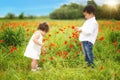 Kazakh little boy and girl together playing