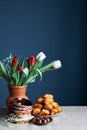 Kazakh national dish, bread baursaks and tulips on Nauryz festival