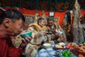 Kazakhs family of hunters with hunting golden eagles inside their the mongolian Yurts.