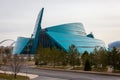 Kazakhstan Central Concert Hall green and blue modern glass building that evokes the dynamism of a flower`s petals.