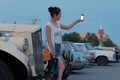 Kazakhstan, Kostanay, 19-06-19, The Greatest Motoring Adventure - Peking to Paris. Asian girl in shorts makes a selfie on the