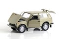 Kazakhstan, Kostanay, January 12, 2024. VAZ-2121 Lada Niva model in 1:24 scale on a white background. Russian SUV car.