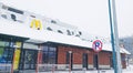 Kazakhstan, Kostanay McDonald`s diner, severe snowstorm in winter. Sign Parking is prohibited