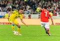 Kazakhstan national football team defender Aibol Abiken against Russia midfielder Magomed Ozdoyev