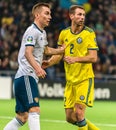 Kazakhstan national football team defender Serhiy Malyi and Russia defender Andrey Semenov