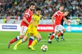 Kazakhstan national football team midfielder Georgi Zhukov against Russia defender Georgi Dzhikiya