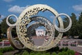 Kazakhstan, Qostanai, August 1, 2022. Sculpture - Rings with ornament in the central park overlooking the university in honor of