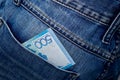 Kazakhstani tenge in the back pocket of jeans. Five hundred tenge in a denim pocket