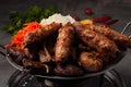 Kazan kebab-assorted meat, heated on the fire. Traditional Asian dish Royalty Free Stock Photo