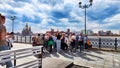 Kazan, Russia - April 29, 2023: Tourists on the waterfront of a city near a river or lake on a summer, autumn, or spring Royalty Free Stock Photo