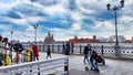 Kazan, Russia - April 29, 2023: Tourists on the waterfront of a city near a river or lake on a summer, autumn, or spring Royalty Free Stock Photo