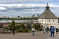 Kazan, Russia - August 9, 2018: View of the Tainitskaya Tower at the entrance to the Kazan Kremlin with tourists against the backg