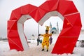 KAZAN, An animator in a horse costume stands in a red heart