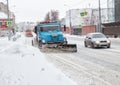 Cars clean snow