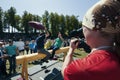 KAZAN, RUSSIA - JUNE 23, 2018: Traditional Tatar festival Sabantuy - Cameraman shooting a fighters on the balance beam