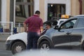 KAZAN, RUSSIA - JUNE 22, 2018: Two male taxi drivers arguing the other at the traffic jam