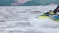 KAZAN, RUSSIA 21-05-21: a man with a little kid riding waverunner in the river