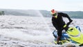 KAZAN, RUSSIA 21-05-21: a man riding yellow waverunner in circles