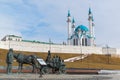 Kazan, Russia - March 28.2017. Monument to benefactor against backdrop of Kazan Kremlin. Russia, Republic of Tatarstan