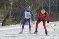 KAZAN, RUSSIA - MARCH, 2018: Two young participants of ski competition on ski track