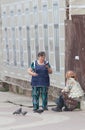 KAZAN, RUSSIA - MAY 17, 2018: Bauman street - Mature female beggar asks for alms on the street