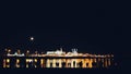 Kazan, Russia, 12 may 2017 - Kazan kremlin with reflection in river at night with silhouettes of people Royalty Free Stock Photo