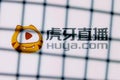 The logo of the Huya live streaming service behind bars