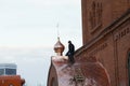 KAZAN, RUSSIA, 19 NOVEMBER 2016, Roofer repairing roof of ortodox Old believers ` Church in winter cold day