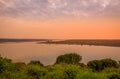 The Kazinga Channel in the Queen Elizabeth National Park in Uganda at sunset.