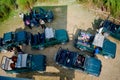 Kaziranga, Assam, India on 13 Nov 2014 - Aerial view of Tourists wating in Jeep for one horned big rhinoceros in the forests of K