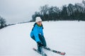 KAZKOVA POLYANA, UKRAINE - January 26, 2019: woman taking selfie while skiing down by snowed hill Royalty Free Stock Photo