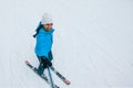 KAZKOVA POLYANA, UKRAINE - January 26, 2019: woman taking selfie while skiing down by snowed hill Royalty Free Stock Photo