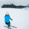 KAZKOVA POLYANA, UKRAINE - January 26, 2019: woman taking selfie while skiing down by snowed hill Royalty Free Stock Photo