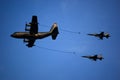 KC-130 refuelling two F-5